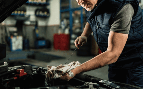 Mechanic fixing Car